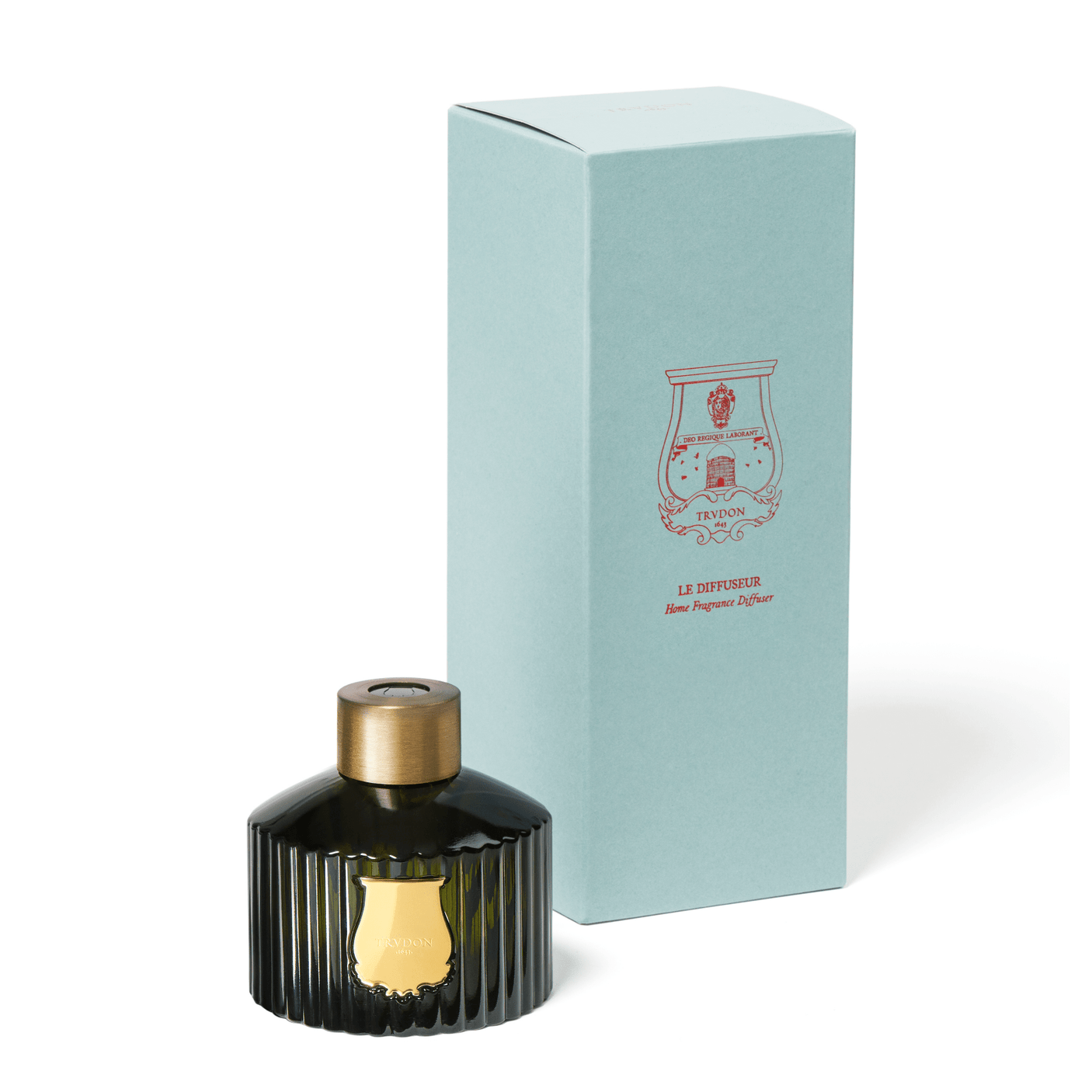 Trudon Diffuser infused with Blackcurrant Bud, Lemon, and Mint presented in its elegant blue packaging.